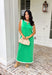Sleek, simple, and effortlessly chic, this green sleeveless midi dress by Entro is a fresh spring staple you’ll wear on repeat. Designed with crisp white contrast binding along the neckline, armholes, and hem, it offers a polished look with just the right amount of edge. A side slit adds easy movement, while the lightweight, soft fabric blend keeps it comfortable for warm spring days and breezy evenings.