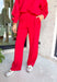 Laid-back comfort meets bold style in these red wide leg pants. Designed with a seam down the front for a flattering touch, they feature an easy elastic waistband that keeps the fit relaxed yet polished. Cozy in a soft modal-blend fabric, these pants are perfect for lounging, running errands, or styling up for a night out. Pair with the matching Point Taken Pullover in Red to wear as a set, or mix and match with your favorite tops for endless outfit possibilities.