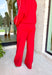 Laid-back comfort meets bold style in these red wide leg pants. Designed with a seam down the front for a flattering touch, they feature an easy elastic waistband that keeps the fit relaxed yet polished. Cozy in a soft modal-blend fabric, these pants are perfect for lounging, running errands, or styling up for a night out. Pair with the matching Point Taken Pullover in Red to wear as a set, or mix and match with your favorite tops for endless outfit possibilities.