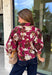 Deep merlot brings a rich seasonal feel to this floral top from Entro. The neutral floral print softens the bold background with warm, easy-to-style shades that fit beautifully into a late-fall wardrobe. A high neckline and button-front closure give the top a classic look, while contrast trim adds another eye-catching detail. The ¾ puff sleeves are finished with buttoned cuffs, and gathering along the back yoke adds subtle shape and movement. 
