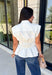 A timeless neutral is always in style, and this cream blouse is one you'll wear on repeat all season long! Designed with a flattering v-neckline and an adjustable self-tie waist, this feminine top creates a beautifully tailored silhouette with effortless comfort. The button front adds a polished touch, while the smocked elastic back offers a flexible, flattering fit. 
