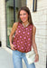 Bold florals and cozy knits make the perfect combination for fall! This sleeveless sweater features a beautiful pink and rust floral pattern that brings a feminine touch to your seasonal wardrobe. Finished with contrast ribbed trim, this lightweight knit is perfect for layering under your favorite blazer, or denim jacket as the weather cools. Whether you're heading to the office, brunch with friends, or a weekend outing, this versatile sweater tank makes transitioning into autumn effortless and stylish.