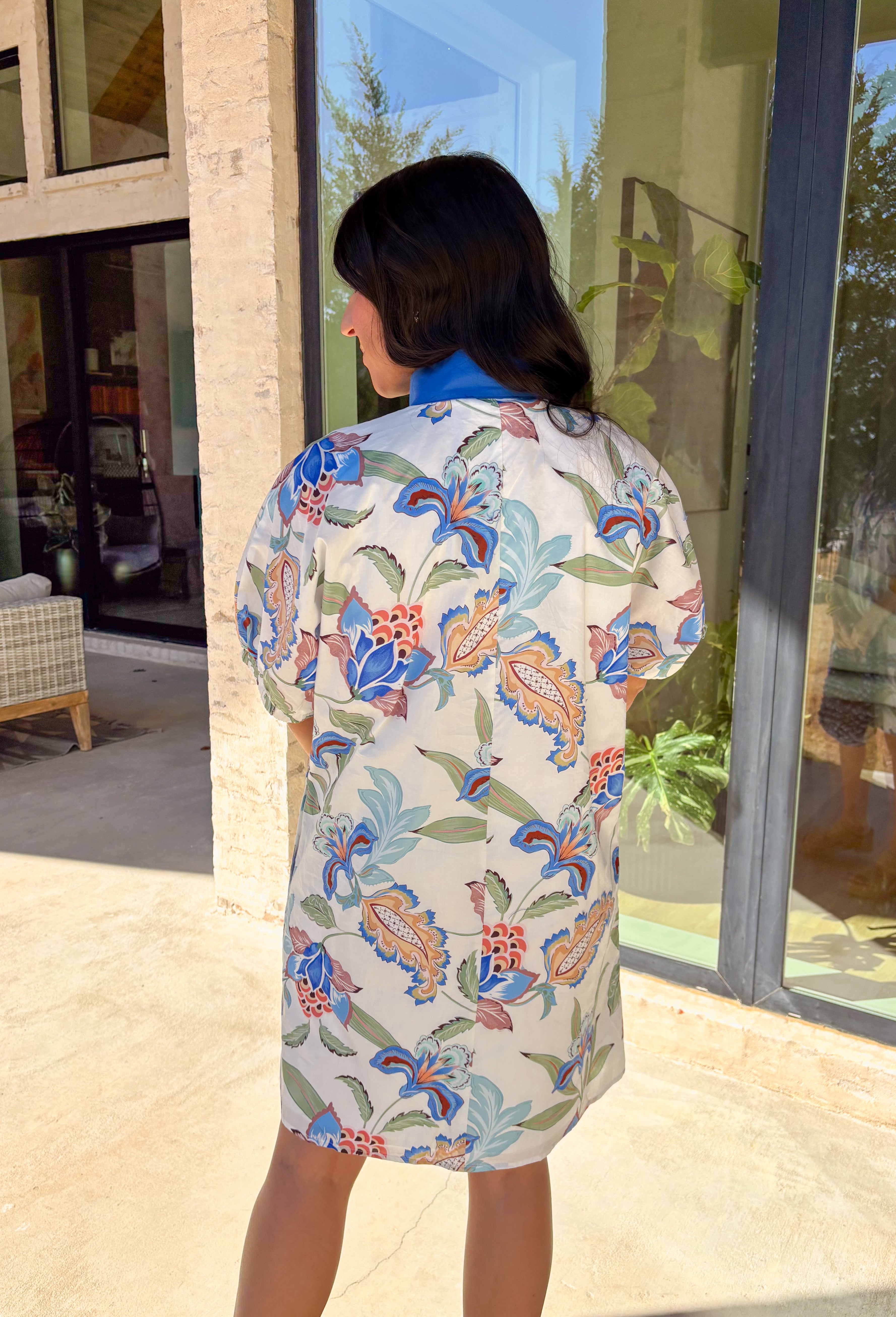 Say hello to your new go-to spring dress! This white dress by Entro is covered in a dreamy floral print in shades of blue with soft pops of green and tan for that fresh, easygoing feel. The contrast blue band collar and v-neckline give it a polished touch, while the puff sleeves and fully lined fit keep it comfy and flattering from brunch dates to baby showers.