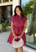 This striped dress brings together rich autumn colors and timeless style for a look you'll love all season long. Featuring brown and vibrant fuchsia stripes, it adds a fun pop of color while still feeling perfectly fall-ready. The front button closure and flattering waist tie create a polished silhouette, while the elastic back waist offers a comfortable fit you'll appreciate from morning to night. Finished with cap sleeves, side pockets, and a fully lined design.