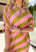 Fresh, fun, and full of spring energy! This pink and green stripe midi dress is the ultimate feel-good piece for sunny days ahead. The playful stripe combination gives it that standout charm, while the flattering midi length keeps it effortlessly polished. Designed with a soft v-neckline and short sleeves finished with elastic cuffs, this dress has just the right amount of structure and ease. Side pockets (yes, please!)