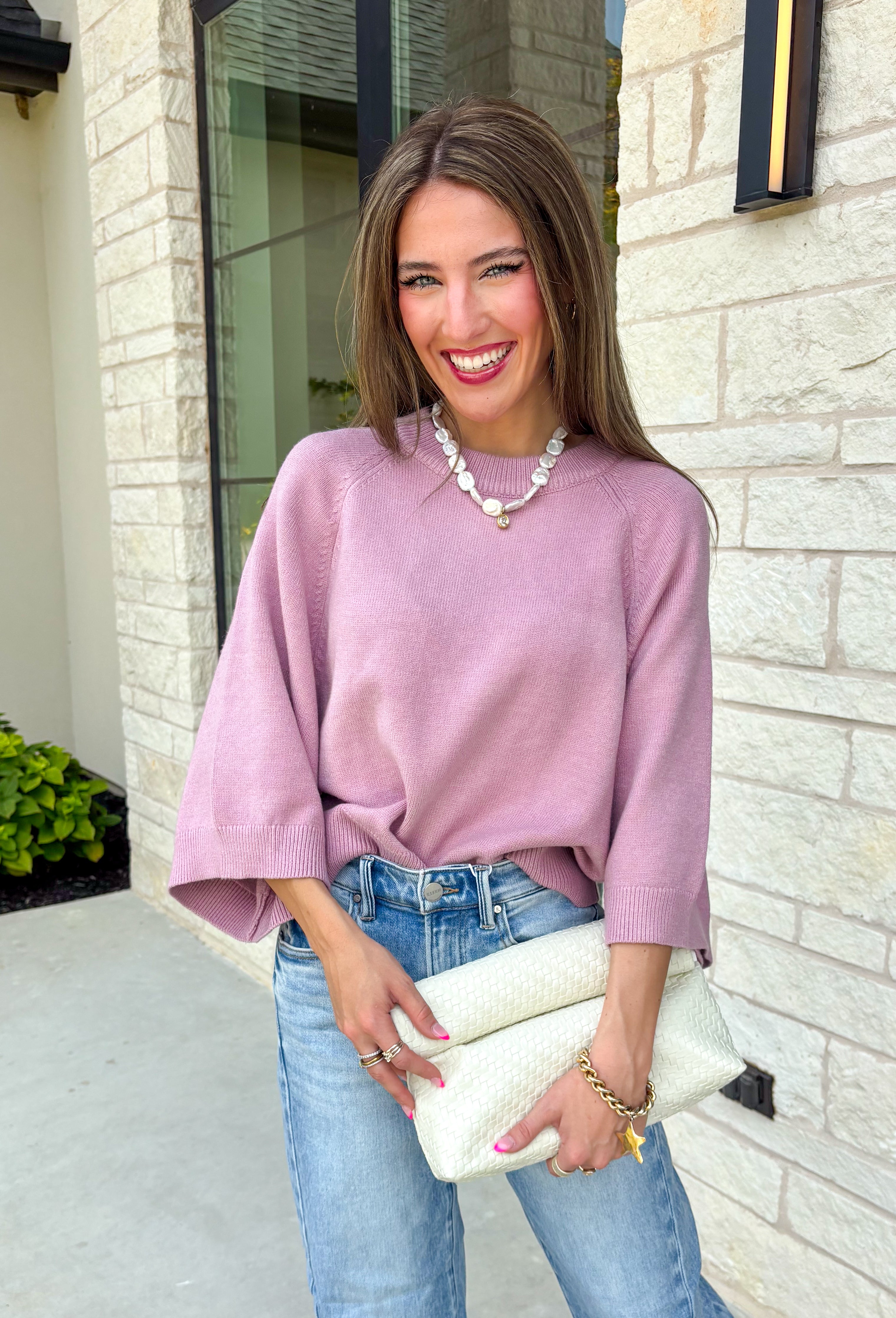 Wrap yourself in effortless comfort with this dreamy dusty lilac sweater! Featuring an oversized silhouette and soft knit fabric, it's the perfect piece for cool mornings, cozy evenings, and everything in between. Pair it with your favorite denim now, then layer it with a vest or jacket as the seasons begin to change for an easy, everyday look.