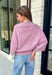 Wrap yourself in effortless comfort with this dreamy dusty lilac sweater! Featuring an oversized silhouette and soft knit fabric, it's the perfect piece for cool mornings, cozy evenings, and everything in between. Pair it with your favorite denim now, then layer it with a vest or jacket as the seasons begin to change for an easy, everyday look.