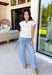 Say hello to your new spring layering favorite! This cream lightweight knit sweater by Entro is the kind of easy, everyday piece that makes getting dressed feel effortless (and cute). With its button-down front and soft sweater knit feel, it gives you that polished “I tried” look while still being comfy enough to wear all day. The short sleeves keep it breezy for warmer weather, but it’s also perfect for those mornings that start chilly and end sunny.