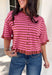 Sweet details and rich fall colors make this knit cardigan an instant favorite. Featuring warm brown and pink stripes, this lightweight cardigan brings the perfect touch of cozy charm to your autumn wardrobe. The ruffle trim on the sleeves and hem adds a feminine finish, while the button-down front lets you wear it as a cardigan or buttoned up as a sweater. It's the perfect transitional knit for everything from office days to weekend coffee runs and crisp fall afternoons.