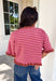 Sweet details and rich fall colors make this knit cardigan an instant favorite. Featuring warm brown and pink stripes, this lightweight cardigan brings the perfect touch of cozy charm to your autumn wardrobe. The ruffle trim on the sleeves and hem adds a feminine finish, while the button-down front lets you wear it as a cardigan or buttoned up as a sweater. It's the perfect transitional knit for everything from office days to weekend coffee runs and crisp fall afternoons.