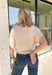 Simple, timeless, and elevated with just the right amount of detail, this ecru knit top is a fall wardrobe essential! Crafted from a soft, lightweight knit, this versatile piece features chic grommet detailing on the sleeves for a modern touch that sets it apart. The classic round neckline makes it easy to style with everything from your favorite denim to tailored trousers, while the cozy feel keeps it comfortable all day long.