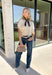 Simple, timeless, and elevated with just the right amount of detail, this ecru knit top is a fall wardrobe essential! Crafted from a soft, lightweight knit, this versatile piece features chic grommet detailing on the sleeves for a modern touch that sets it apart. The classic round neckline makes it easy to style with everything from your favorite denim to tailored trousers, while the cozy feel keeps it comfortable all day long.