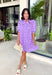 This lavender floral dress is such a beautiful blend of classic and feminine for summer! The soft lavender base paired with blue and white floral blooms creates a fresh, eye-catching look that feels perfect for everything from brunch to baby showers. The button down design gives it a timeless feel, while the pleated sleeves add a sweet, elevated touch. Fully lined and finished with side pockets (always a favorite), this dress is as practical as it is pretty. 