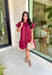 This burgundy ruffle mini dress is giving effortless charm with a touch of flirty flair. The playful ruffle hem and dainty button-front detail add just the right amount of movement, while side pockets keep it practical (because we all love a good pocket moment). Whether you’re headed to a fall brunch or layering it with boots and a denim jacket, this dress is a go-to for cozy and cute autumn style.