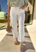 Clean, cool, and perfectly on trend, these cream barrel jeans by Risen are a spring wardrobe must-have. The modern barrel-leg silhouette gives them that effortlessly styled look, while the soft stretch denim keeps them comfortable for everyday wear. Easy to dress up or down, these jeans pair beautifully with everything from floral tops to lightweight knits as the season warms up.