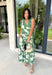This darker green floral midi dress is such a dreamy, easy piece for summer days! The neutral floral print keeps it soft and wearable, while the tiered ruffle details add beautiful movement and dimension. Designed with adjustable tie straps and an elastic waist, it gives you that flattering, comfortable fit you’ll love all day long. The v-neckline adds a feminine touch, and of course—side pockets make it even better. Fully lined and lightweight, it’s perfect for everything from brunch to vacation dinners. 