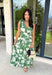This darker green floral midi dress is such a dreamy, easy piece for summer days! The neutral floral print keeps it soft and wearable, while the tiered ruffle details add beautiful movement and dimension. Designed with adjustable tie straps and an elastic waist, it gives you that flattering, comfortable fit you’ll love all day long. The v-neckline adds a feminine touch, and of course—side pockets make it even better. Fully lined and lightweight, it’s perfect for everything from brunch to vacation dinners. 