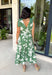 This darker green floral midi dress is such a dreamy, easy piece for summer days! The neutral floral print keeps it soft and wearable, while the tiered ruffle details add beautiful movement and dimension. Designed with adjustable tie straps and an elastic waist, it gives you that flattering, comfortable fit you’ll love all day long. The v-neckline adds a feminine touch, and of course—side pockets make it even better. Fully lined and lightweight, it’s perfect for everything from brunch to vacation dinners. 