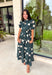 Timeless style meets effortless charm in this beautiful polka dot midi dress. Featuring a rich hunter green backdrop with a bold neutral polka dot print, this classic silhouette is one you'll love wearing year after year. The button-front design and adjustable self-tie waist create a flattering, feminine fit, while the puff sleeves add just the right amount of romantic detail. Complete with side pockets and a fully lined design, this cotton dress is as practical as it is polished.