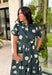 Timeless style meets effortless charm in this beautiful polka dot midi dress. Featuring a rich hunter green backdrop with a bold neutral polka dot print, this classic silhouette is one you'll love wearing year after year. The button-front design and adjustable self-tie waist create a flattering, feminine fit, while the puff sleeves add just the right amount of romantic detail. Complete with side pockets and a fully lined design, this cotton dress is as practical as it is polished.