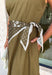 Chic with a unique twist, this midi dress from Entro is a standout addition to your fall wardrobe. Designed in a rich olive green hue, this sleeveless dress features a removable printed scarf overlay that instantly elevates the look and offers versatile styling options. The bubble hem adds modern shape and movement, while the fully lined design and convenient side pockets provide comfort and functionality. 