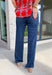 A great pair of classic denim is a must-have in every wardrobe, and these wide leg jeans from Flying Monkey are a style you'll wear season after season. Designed in a rich dark wash with a clean, timeless finish, these jeans offer endless styling possibilities. The flattering mid-rise waist and modern wide leg silhouette create an effortlessly polished look, while the soft stretch denim keeps you comfortable all day long.