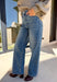 Make your winter wardrobe shine with these statement-making straight jeans by Just Black Denim. Designed in a classic medium wash with a flattering high rise, these standout denim gems are covered in silver rhinestones from front to back for the perfect touch of sparkle. With a structured yet comfortable fit, they’re ready for holiday parties, festive nights out, or whenever you want to turn heads.