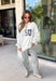 Wear your faith in the coziest way with this heather grey “Jesus” pullover from Bucket List. Each letter features its own unique print, including dainty florals, classic stripes, plaid, and solid navy in a soft mix of neutrals and shades of blue. Light grey embroidery outlines each letter for an extra touch of texture that makes the design stand out beautifully against the heather grey background. 