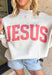 This heathered grey reversible pullover is the cozy, feel-good piece your summer evenings need! Designed with two meaningful looks in one, one side features “Jesus” in coral, while the other side is soft sherpa lined with “God Is Good” for an extra cozy vibe. The mock neck adds a polished touch, making it perfect for breezy nights, early mornings, or lounging in comfort. It’s the kind of piece that feels just as good as it looks—easy, meaningful, and made to wear on repeat. 