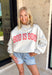 This heathered grey reversible pullover is the cozy, feel-good piece your summer evenings need! Designed with two meaningful looks in one, one side features “Jesus” in coral, while the other side is soft sherpa lined with “God Is Good” for an extra cozy vibe. The mock neck adds a polished touch, making it perfect for breezy nights, early mornings, or lounging in comfort. It’s the kind of piece that feels just as good as it looks—easy, meaningful, and made to wear on repeat. 