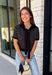 Get the layered look without the extra effort in this cozy short sleeve sweater. Featuring classic black and off white stripes, this knit is designed with an attached layered scarf detail that instantly elevates your outfit. The soft sweater knit keeps you cozy while the short sleeves make it perfect for transitioning through the season and layering under your favorite jackets. Finished with ribbed trim along the neckline, sleeves, and hem.