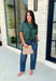 Get the layered look without the extra effort in this cozy short sleeve sweater. Featuring rich hunter green and off white stripes, this knit is designed with an attached layered scarf detail that instantly elevates your outfit. The soft sweater knit keeps you cozy while the short sleeves make it perfect for transitioning through the season and layering under your favorite jackets. 