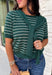 Get the layered look without the extra effort in this cozy short sleeve sweater. Featuring rich hunter green and off white stripes, this knit is designed with an attached layered scarf detail that instantly elevates your outfit. The soft sweater knit keeps you cozy while the short sleeves make it perfect for transitioning through the season and layering under your favorite jackets. 