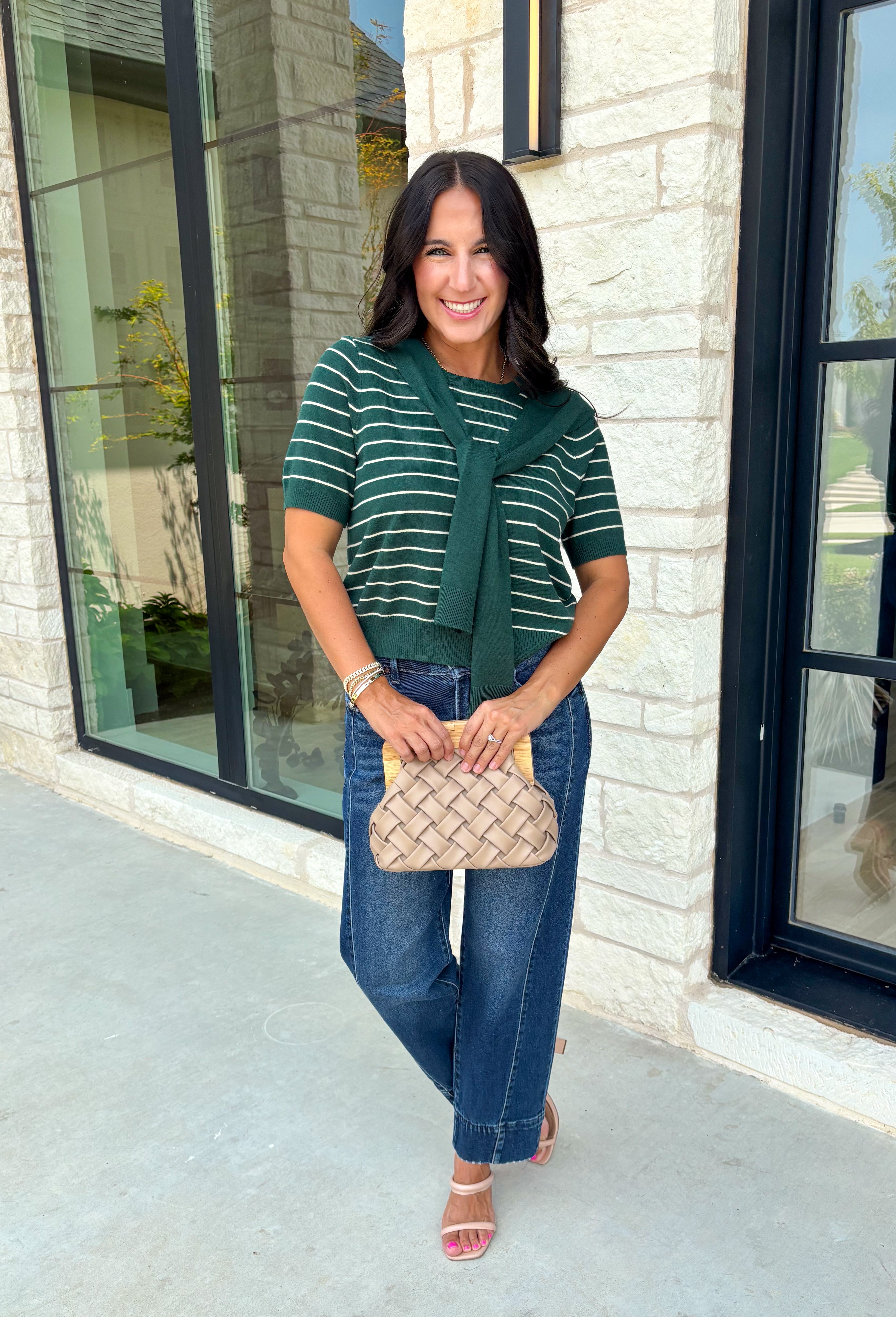 Get the layered look without the extra effort in this cozy short sleeve sweater. Featuring rich hunter green and off white stripes, this knit is designed with an attached layered scarf detail that instantly elevates your outfit. The soft sweater knit keeps you cozy while the short sleeves make it perfect for transitioning through the season and layering under your favorite jackets. 