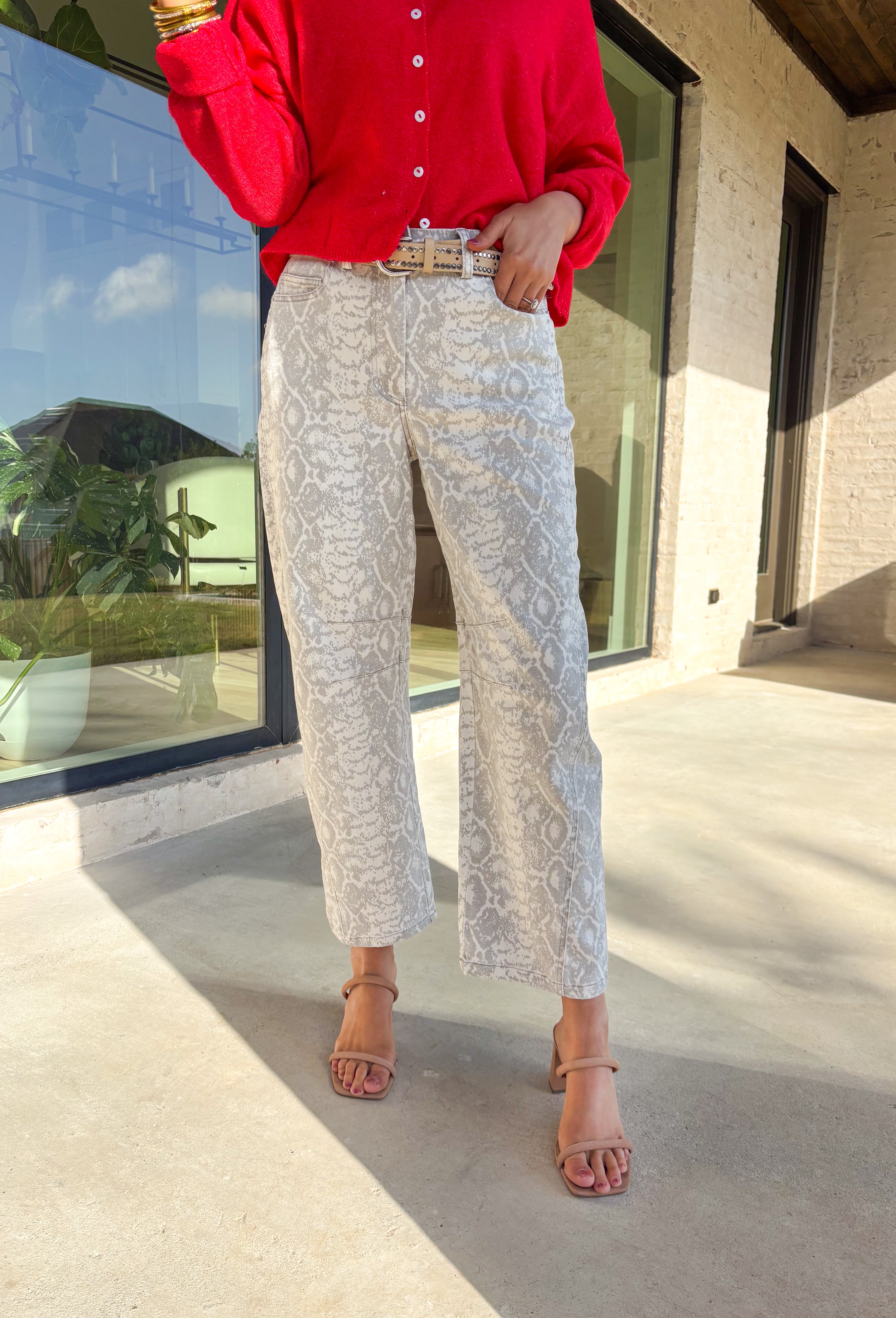 Step into the season with a hint of edge in these neutral snakeskin barrel jeans by Skies Are Blue. Designed with a flattering high-rise fit and a soft cotton blend, these jeans bring a chic twist to your winter wardrobe. The subtle snakeskin print adds texture and personality, while the barrel leg silhouette gives them a trendy, modern feel.