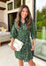 Fresh color meets effortless style in this beautifully designed dress from Entro. Featuring a soft light blue backdrop with a striking hunter green abstract print, this timeless dress is perfect for transitioning through the season. The collared neckline and button-front design create a polished, classic look, while the matching self-tie belt cinches the waist for a flattering silhouette. 