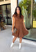 Holiday plans call for a dress that feels just as special as the occasion, and this brown faux suede dress from Fate is ready for every invite. The rich brown color and soft faux suede give it a warm seasonal look, while the structured paneled silhouette creates a flattering, defined shape. Vertical seaming through the bodice draws the eye to the fitted waist and hips before flowing into a flared A-line skirt. 