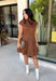 Holiday plans call for a dress that feels just as special as the occasion, and this brown faux suede dress from Fate is ready for every invite. The rich brown color and soft faux suede give it a warm seasonal look, while the structured paneled silhouette creates a flattering, defined shape. Vertical seaming through the bodice draws the eye to the fitted waist and hips before flowing into a flared A-line skirt. 