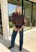 Meet the kind of top that makes getting dressed for the day feel easy. This solid top from Entro features a stand collar and partial button-front closure for a clean, classic look that works just as well at the office as it does for weekend plans. The ¾ balloon sleeves bring a little volume to the silhouette, while the elastic hem creates a flattering shape without needing to tuck it in. Lightweight and versatile, it’s an easy piece to pair with denim, trousers, or skirts throughout the fall season.