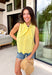 This lemon yellow sleeveless top is pure sunshine for your summer wardrobe! The bright, happy color instantly lifts your look, while the eyelet embroidery adds the prettiest touch of texture. The self-tie neckline brings a soft, feminine detail, and the scalloped hem gives it that extra something special. Designed with a button front and lightweight cotton fabric, it’s breathable and easy to wear all day long. Pair it with white denim or shorts for a fresh, standout outfit—this one is made for sunny days.