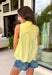 This lemon yellow sleeveless top is pure sunshine for your summer wardrobe! The bright, happy color instantly lifts your look, while the eyelet embroidery adds the prettiest touch of texture. The self-tie neckline brings a soft, feminine detail, and the scalloped hem gives it that extra something special. Designed with a button front and lightweight cotton fabric, it’s breathable and easy to wear all day long. Pair it with white denim or shorts for a fresh, standout outfit—this one is made for sunny days.