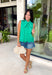This green sleeveless top is pure happiness for your summer wardrobe! The bright, happy color instantly lifts your look, while the eyelet embroidery adds the prettiest touch of texture. The self-tie neckline brings a soft, feminine detail, and the scalloped hem gives it that extra something special. Designed with a button front and lightweight cotton fabric, it’s breathable and easy to wear all day long. Pair it with white denim or shorts for a fresh, standout outfit—this one is made for sunny days.