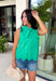 This green sleeveless top is pure happiness for your summer wardrobe! The bright, happy color instantly lifts your look, while the eyelet embroidery adds the prettiest touch of texture. The self-tie neckline brings a soft, feminine detail, and the scalloped hem gives it that extra something special. Designed with a button front and lightweight cotton fabric, it’s breathable and easy to wear all day long. Pair it with white denim or shorts for a fresh, standout outfit—this one is made for sunny days.