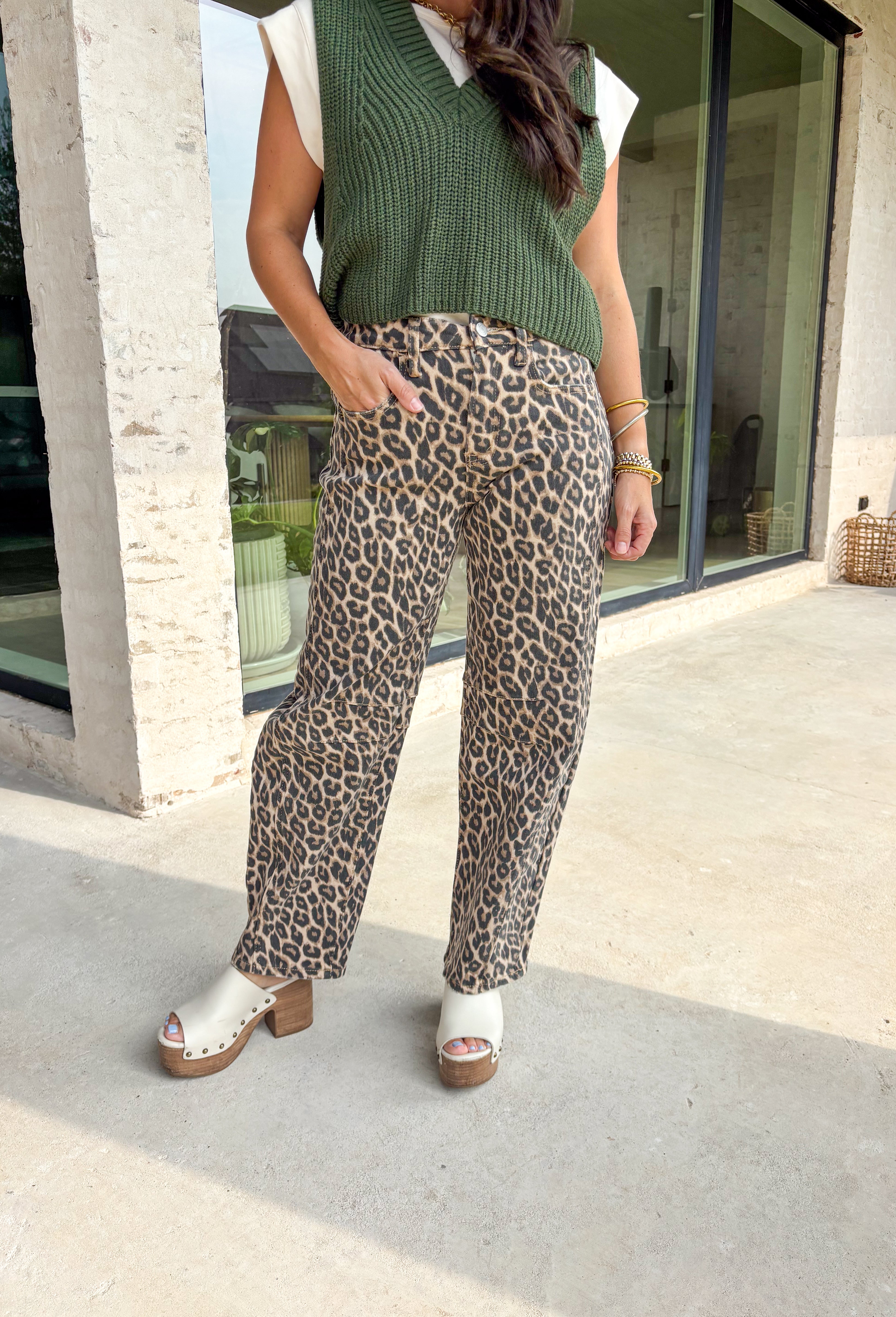 Make your denim days a little wilder with these trendy leopard barrel jeans from Vervet. The subtle yet bold animal print gives your outfit instant personality, while the barrel leg fit keeps things modern and right on trend. Crafted from a soft cotton blend with a hint of stretch, they’re comfortable enough for everyday wear but statement-making enough to stand out. Perfect for pairing with a simple knit or layering under a chunky cardigan for a cozy-chic fall look.
