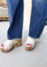 Everyone’s favorite jean is back in a versatile new wash you'll wear on repeat! These dark wash barrel jeans combine the trending silhouette everyone loves with a rich, polished color that transitions effortlessly through every season. The flattering high-rise fit creates a streamlined look, while the barrel leg shape adds a modern touch that's both comfortable and easy to style. 