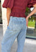 Everyone's favorite barrel jean just got a glamorous upgrade! These high-rise light wash barrel jeans feature crystal and embellishment details throughout, giving a trendy silhouette an eye-catching twist. The flattering high-rise fit helps create a streamlined shape, while the relaxed barrel leg keeps them comfortable and on-trend. Perfect for date nights, concerts, weekend outings, or simply elevating your everyday style, these jeans effortlessly blend casual and chic.