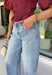 Everyone's favorite barrel jean just got a glamorous upgrade! These high-rise light wash barrel jeans feature crystal and embellishment details throughout, giving a trendy silhouette an eye-catching twist. The flattering high-rise fit helps create a streamlined shape, while the relaxed barrel leg keeps them comfortable and on-trend. Perfect for date nights, concerts, weekend outings, or simply elevating your everyday style, these jeans effortlessly blend casual and chic.