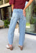 Everyone's favorite barrel jean just got a glamorous upgrade! These high-rise light wash barrel jeans feature crystal and embellishment details throughout, giving a trendy silhouette an eye-catching twist. The flattering high-rise fit helps create a streamlined shape, while the relaxed barrel leg keeps them comfortable and on-trend. Perfect for date nights, concerts, weekend outings, or simply elevating your everyday style, these jeans effortlessly blend casual and chic.