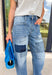 Your favorite barrel jeans are back in a fresh new style! These medium wash barrel jeans from Vervet feature the same flattering silhouette you already love, now updated with eye-catching patchwork detailing for an effortlessly cool, lived-in look. Crafted from comfortable stretch denim, they offer an easy fit that's perfect for everyday wear while adding a unique touch to any outfit. 