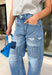 Your favorite barrel jeans are back in a fresh new style! These medium wash barrel jeans from Vervet feature the same flattering silhouette you already love, now updated with eye-catching patchwork detailing for an effortlessly cool, lived-in look. Crafted from comfortable stretch denim, they offer an easy fit that's perfect for everyday wear while adding a unique touch to any outfit. 